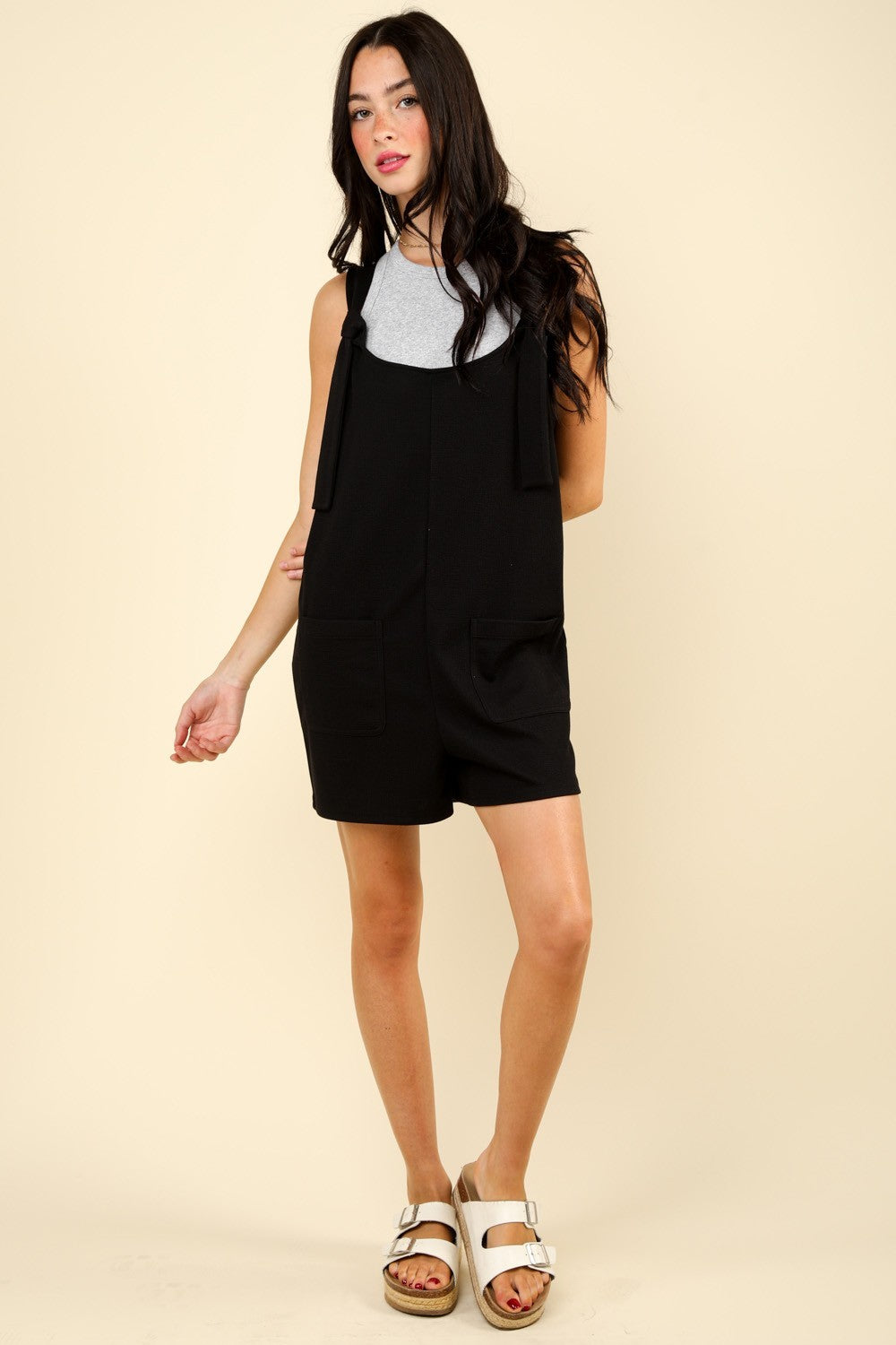 Front Pocket Romper In Black